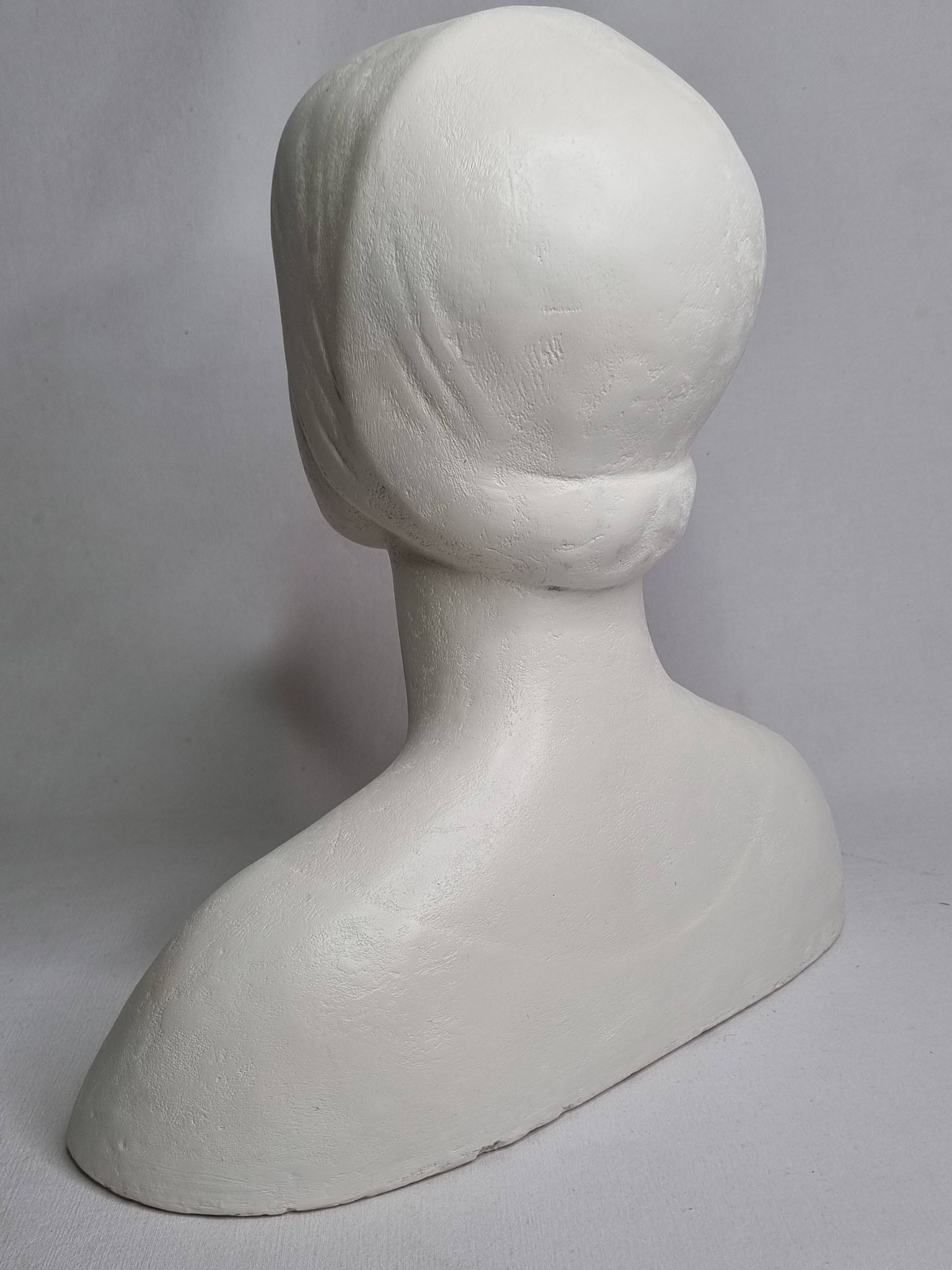 Bust after Laurana in Renaissance style, known as Aragon, patinated plaster, 33 cm.
