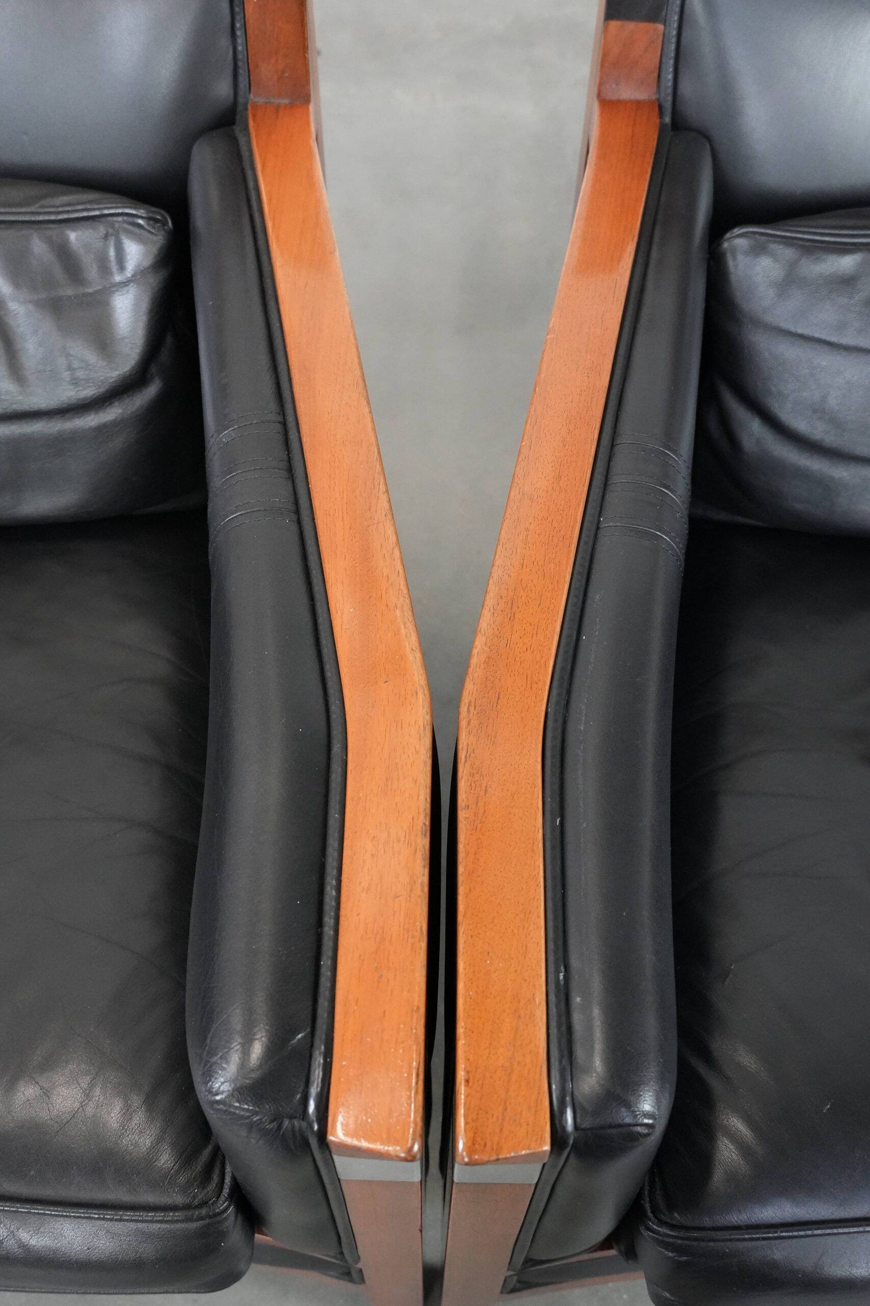 Set of  two black leather Art Deco design armchairs