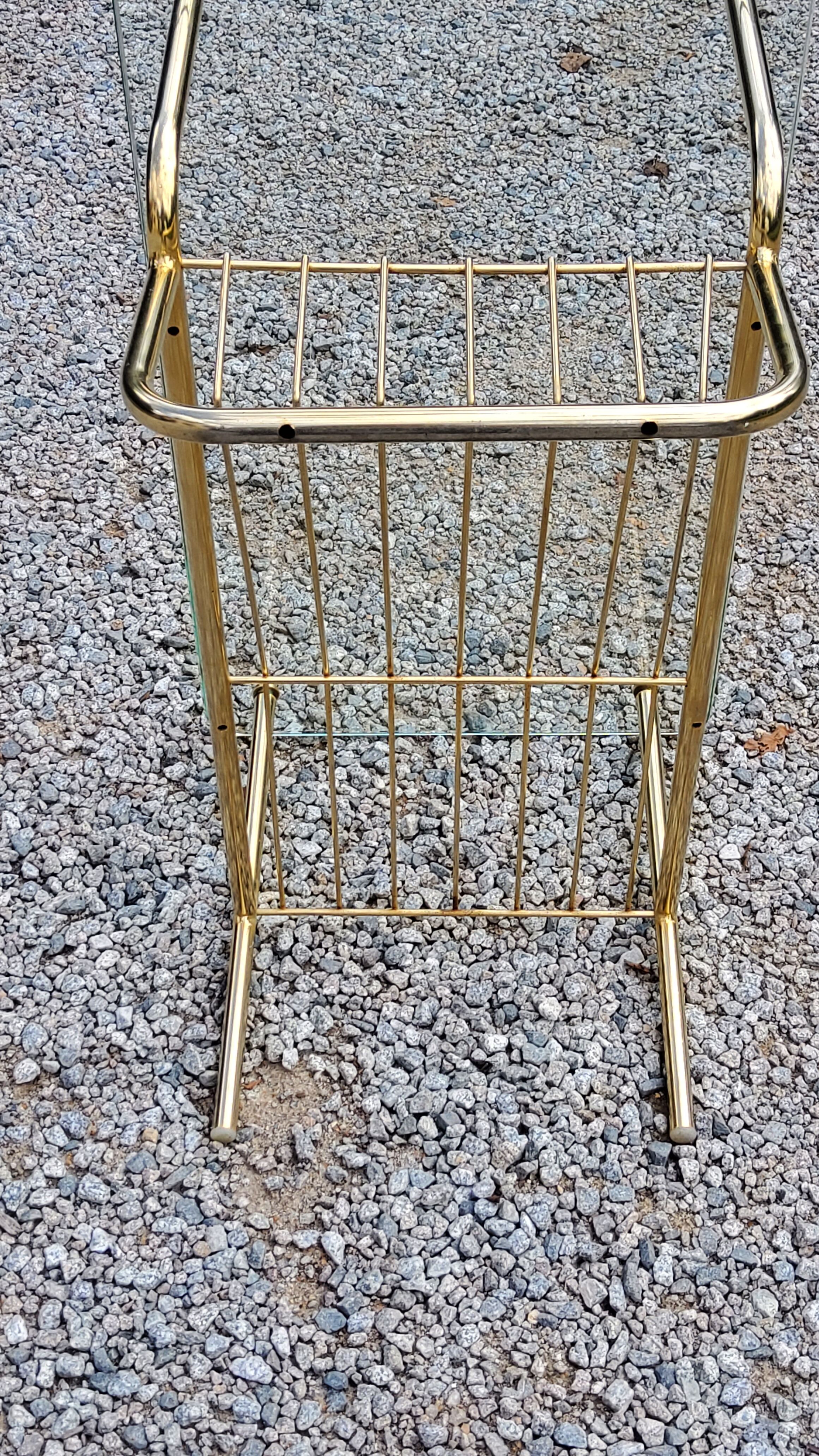 Coffee table from the 60s top glass base metal gilded
