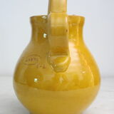 Enamelled terracotta jug