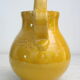 Enamelled terracotta jug