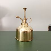 Vaporisateur vintage en laiton doré années 70