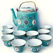 Chinese porcelain tea service with wicker basket