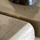 Art Deco bookends with patinated ibex in a taupe marble base.