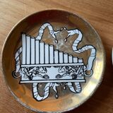 Small Fornasetti plates