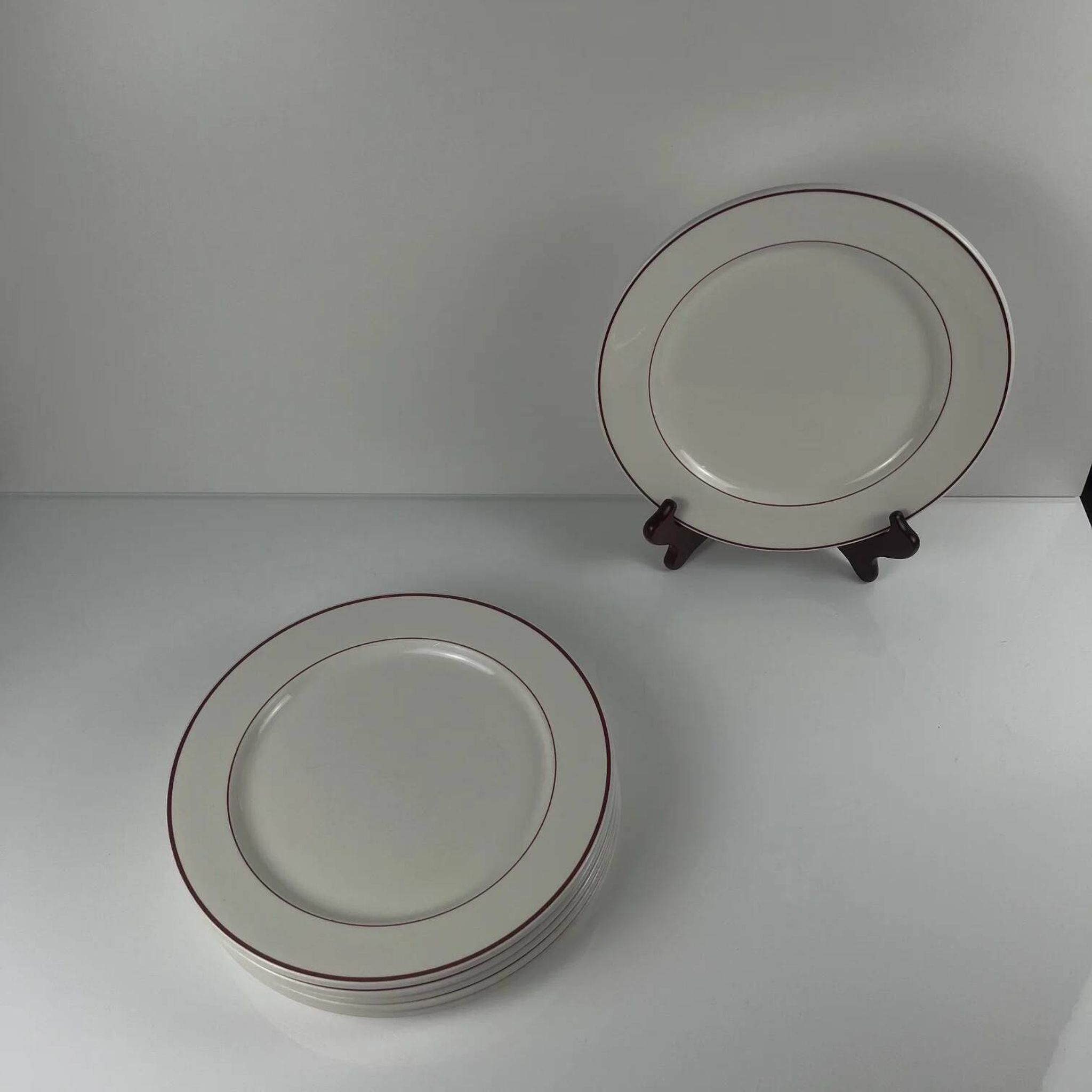 Set of 6 flat plates Villeroy & Boch, burgundy/purple rim, 20th century.