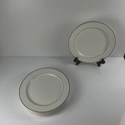 Set of 6 flat plates Villeroy & Boch, burgundy/purple rim, 20th century.