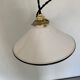 Old pair of white industrial metal suspensions with black border