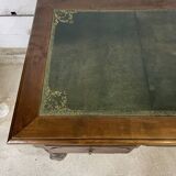 Double-sided desk with leather top