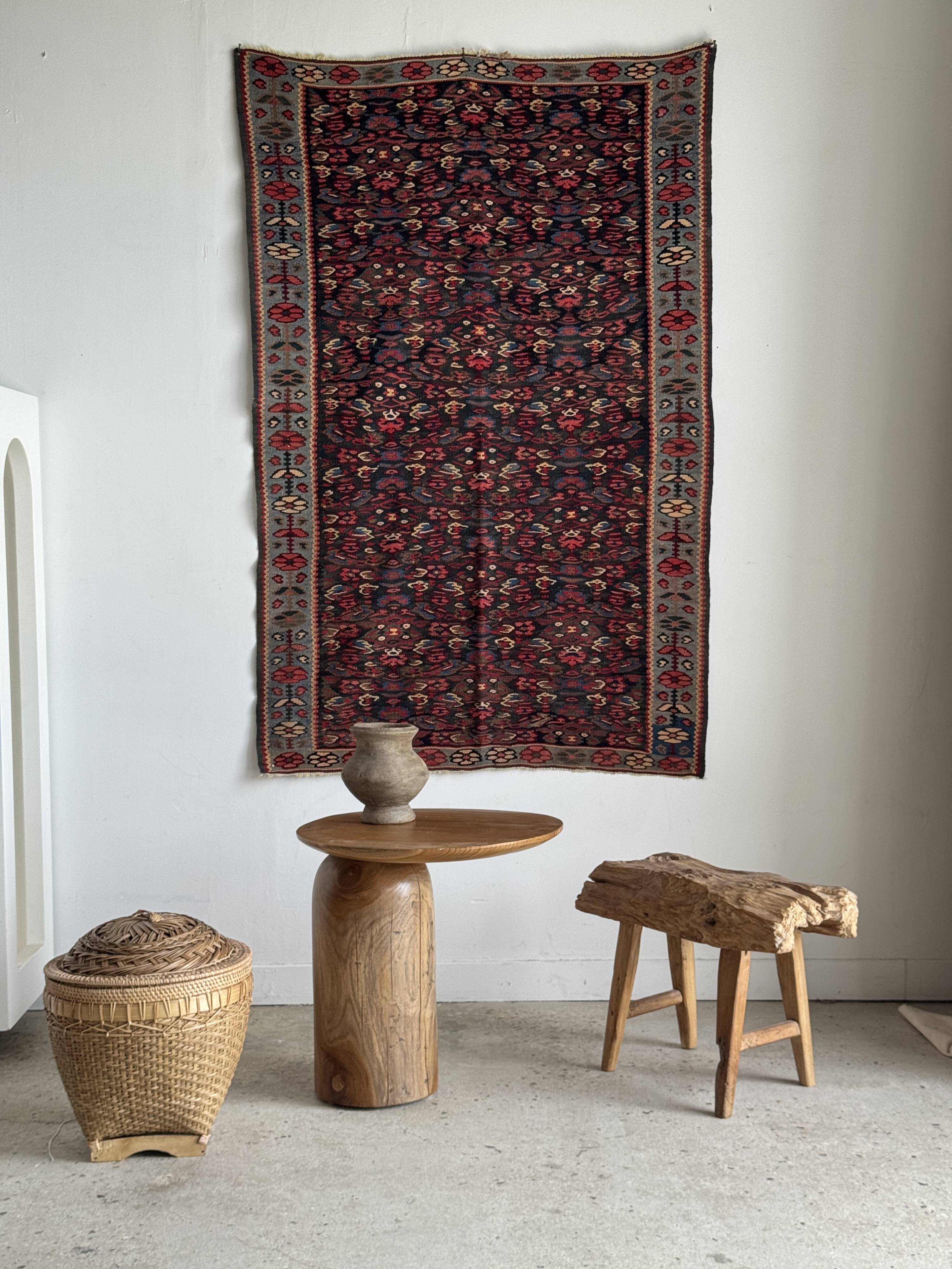 Iranian rug with stylised floral patterns in pink and blue, 155x105.