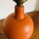 Orange turned wooden lamp base