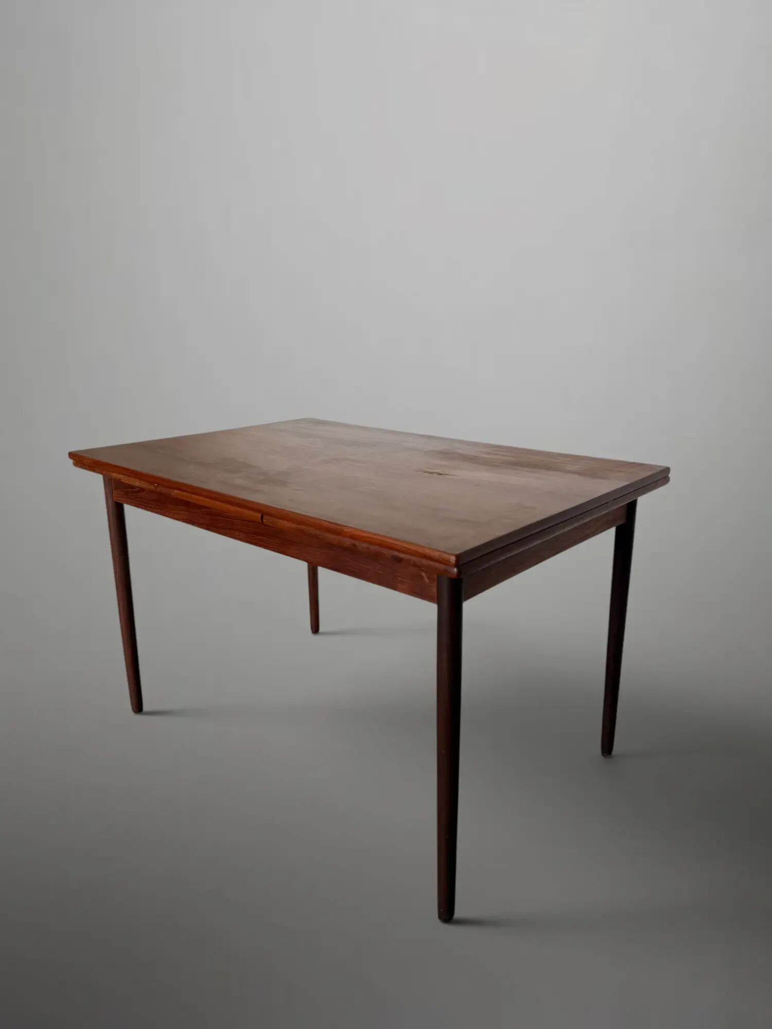 Scandinavian extendable dining table in teak