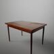 Scandinavian extendable dining table in teak