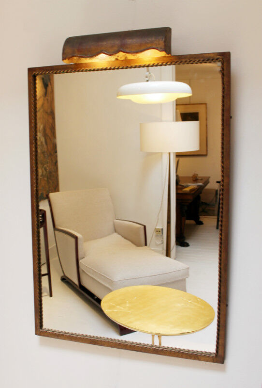 Mirror lighting in gilded wrought iron