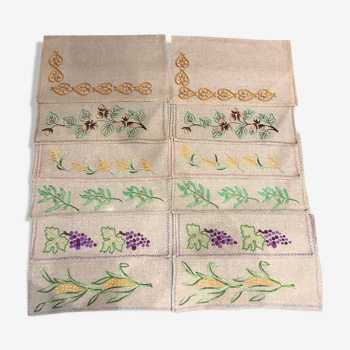 Set of 12 embroidered linen table sets