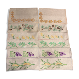 Set of 12 embroidered linen table sets