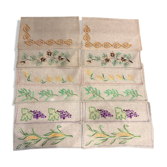 Set of 12 embroidered linen table sets