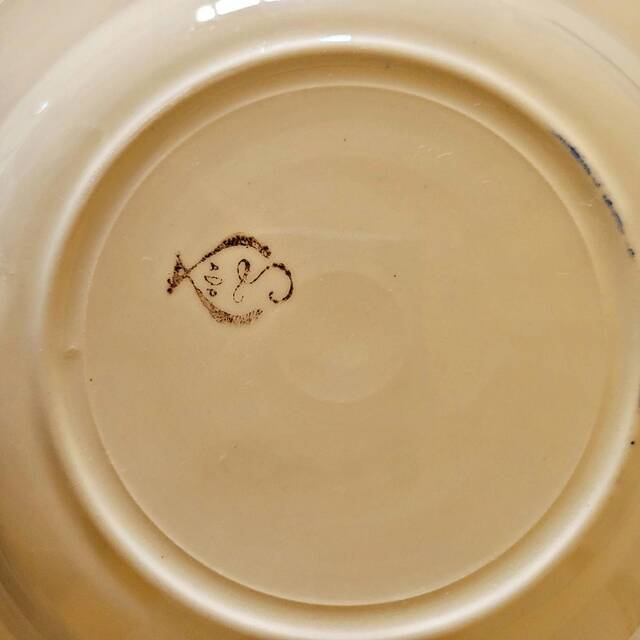 Vintage deep plates in ADP earthenware, blue rose patterns.