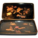 Set of two brown and black Chinese lacquer trays with bird decor
