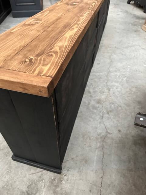 Old piece of furniture transformed into a TV stand