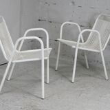 Pair of honeycomb steel armchairs. France, circa 1950.