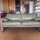 Two-seater Maralunga sofa in olive green leather.
