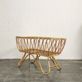 Baby cradle in vintage rattan