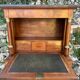 A small piece of Bonheur du jour with detached columns in Empire-era mahogany.
