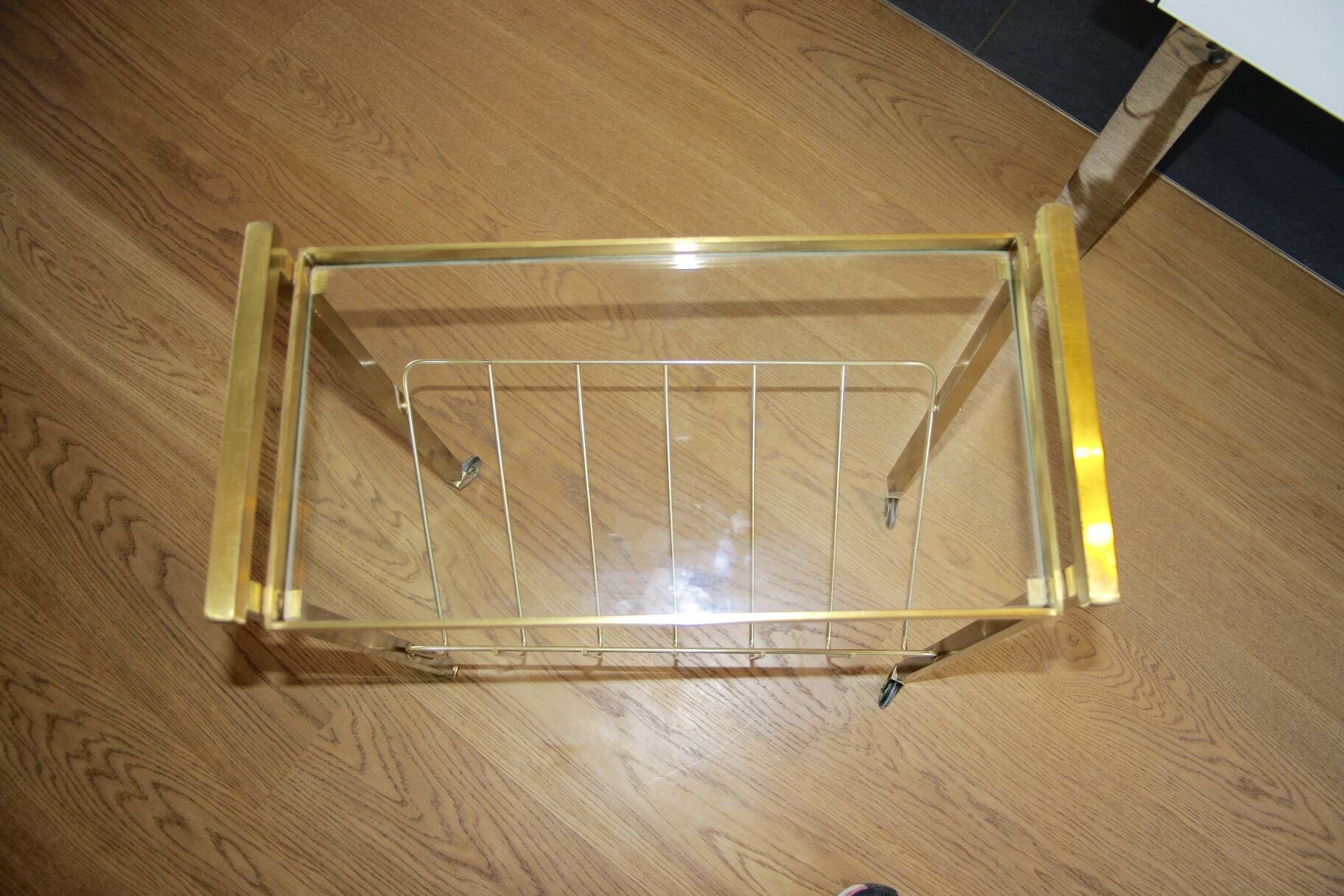 Vintage side table with brass and glass magazine rack