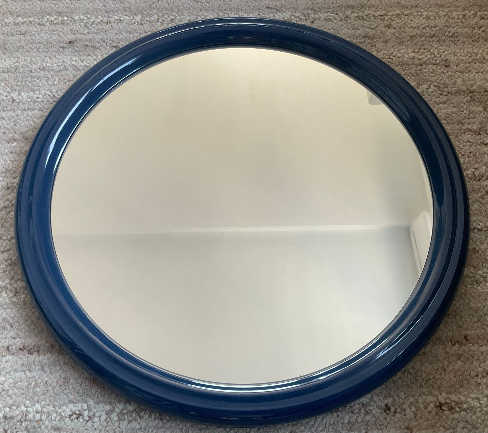 Round Tiger mirror from the 1970s.