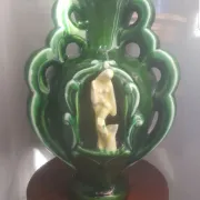 Earthenware vase with 3 caryatids