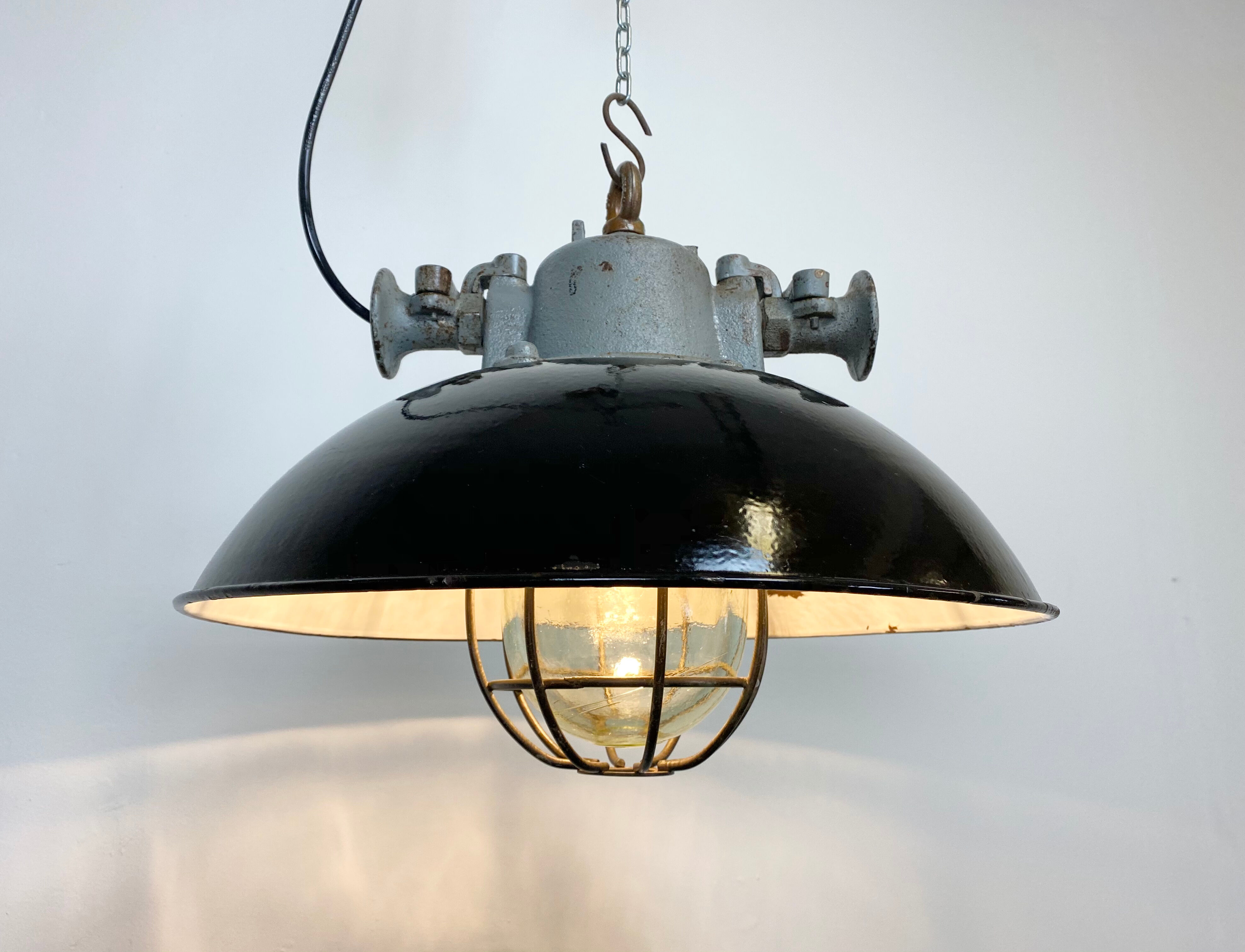 Black enamel and cast iron industrial cage pendant lamp, 1950