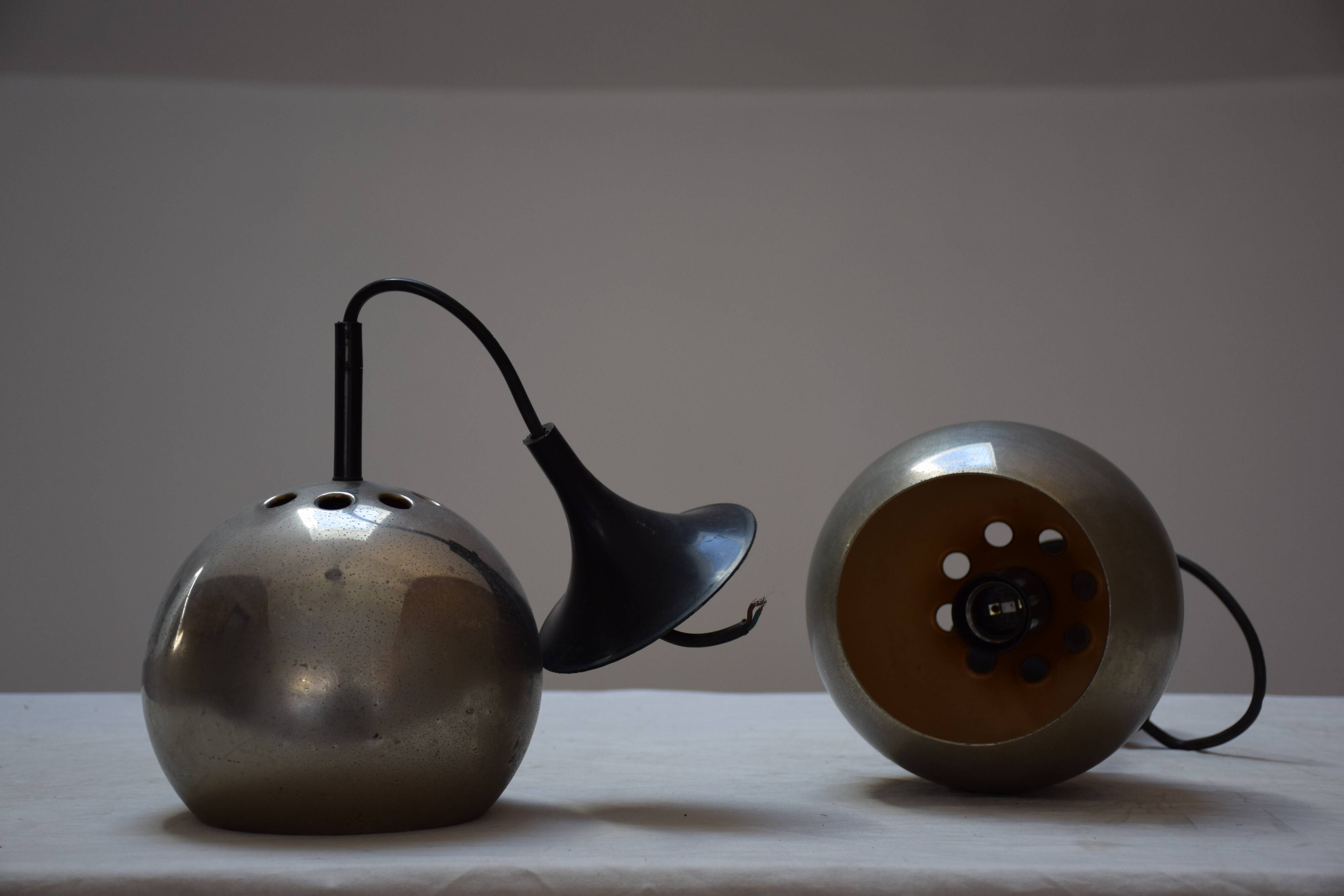 Pair chrome balls hanging lamps