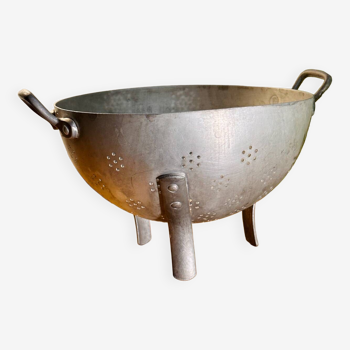 Old aluminum colander