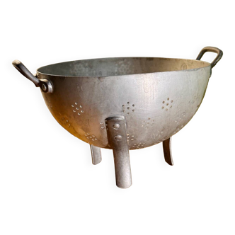 Old aluminum colander