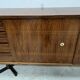 Scandinavian enfilade in veneered wood with iron legs, 20th century.