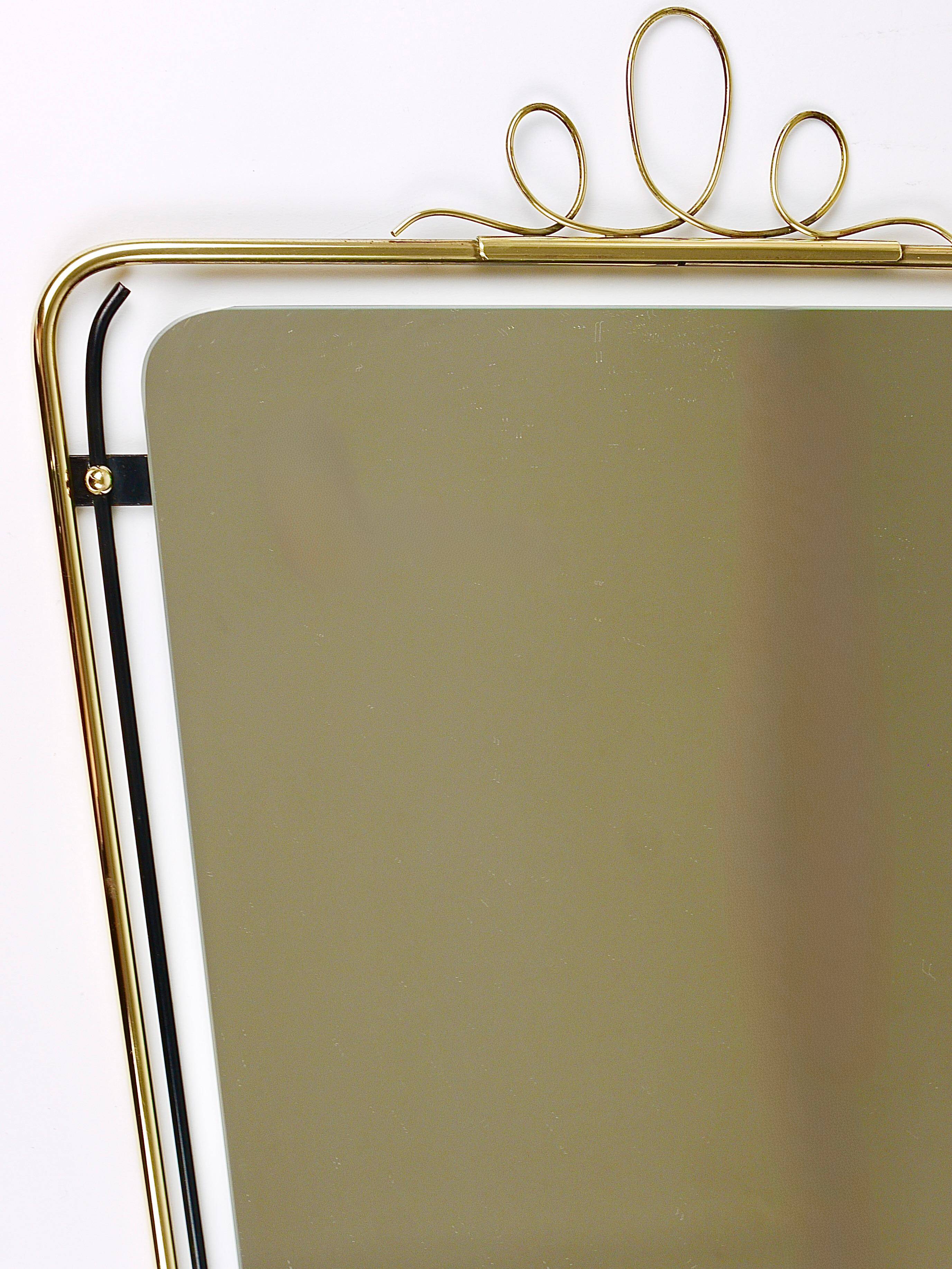 Wall mirror in brass wire with modernist loops from the mid-century, Italy, 1950s.