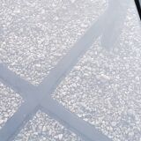 70s design coffee table in black lacquered wood with smoked glass top