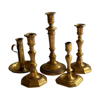Set of 5 bronze and brass candlesticks