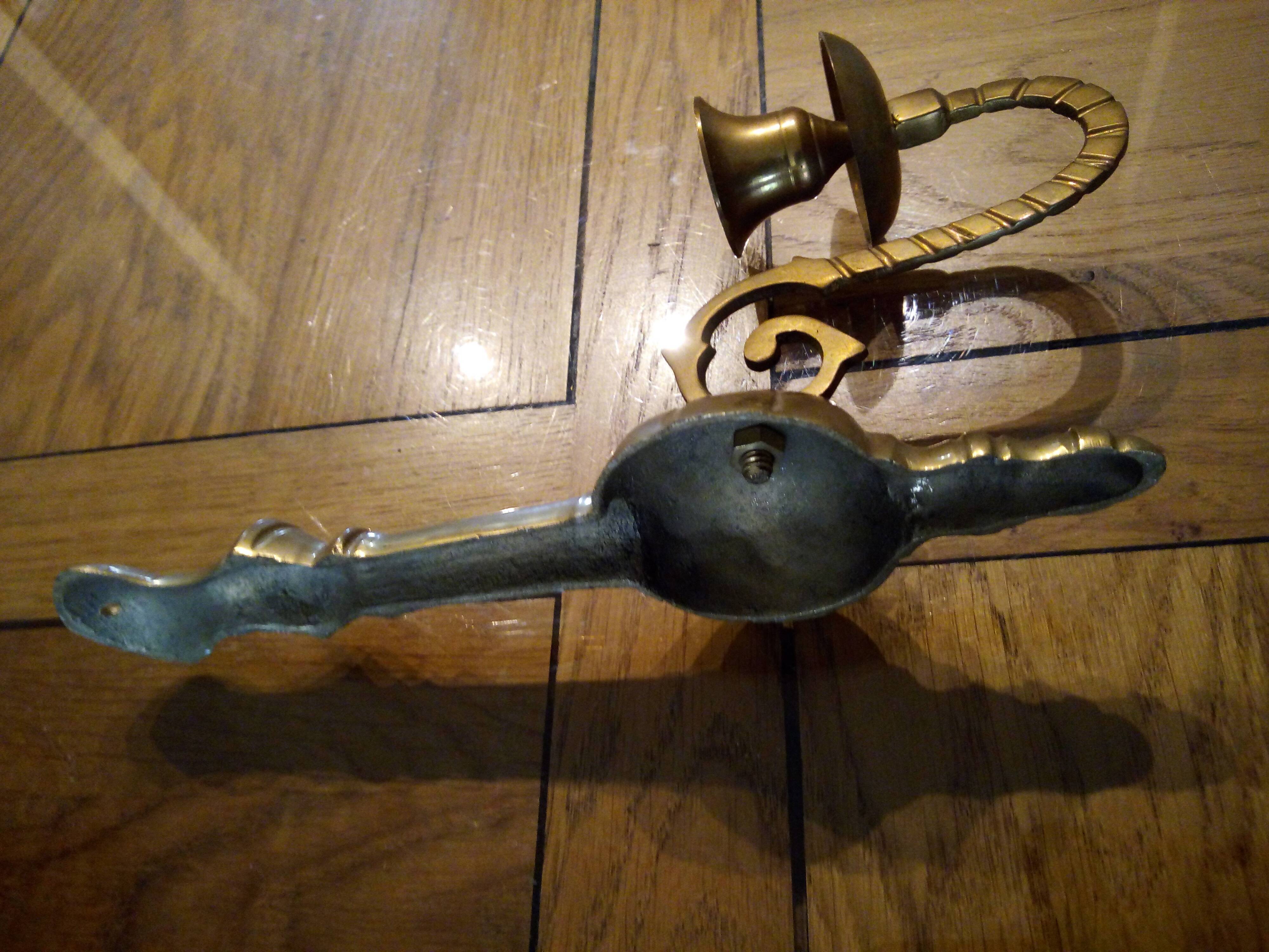 Two candlestick sconces