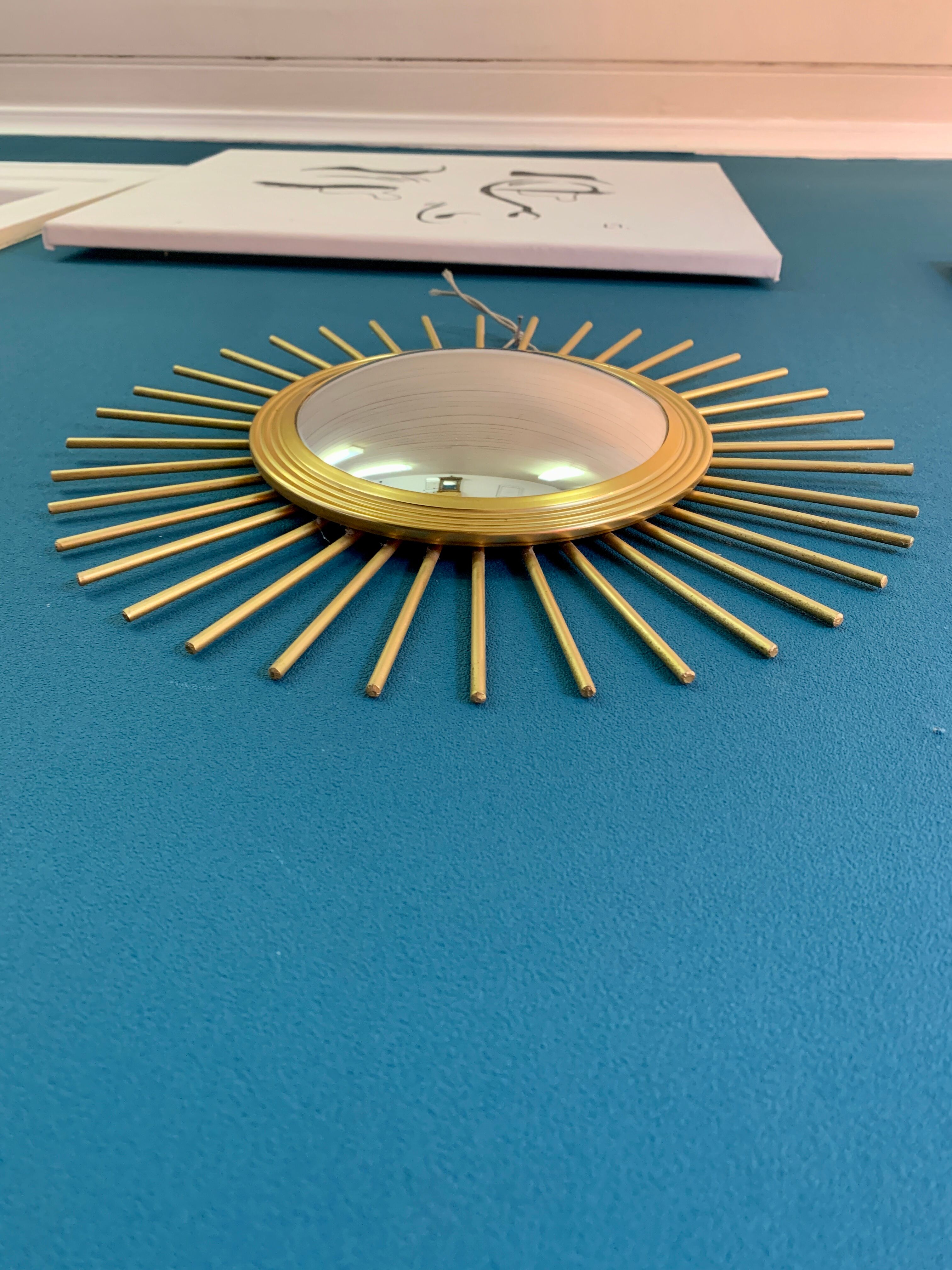Vintage metal sun mirror