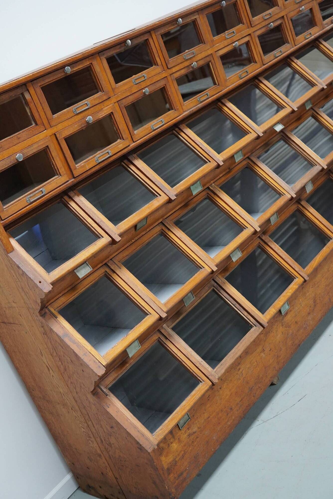 Very large Dutch oak showcase for grocery or haberdashery, 1920s-1930s