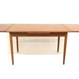 Teak “portfolio” dining room table, Farstrup, Denmark, 1960s