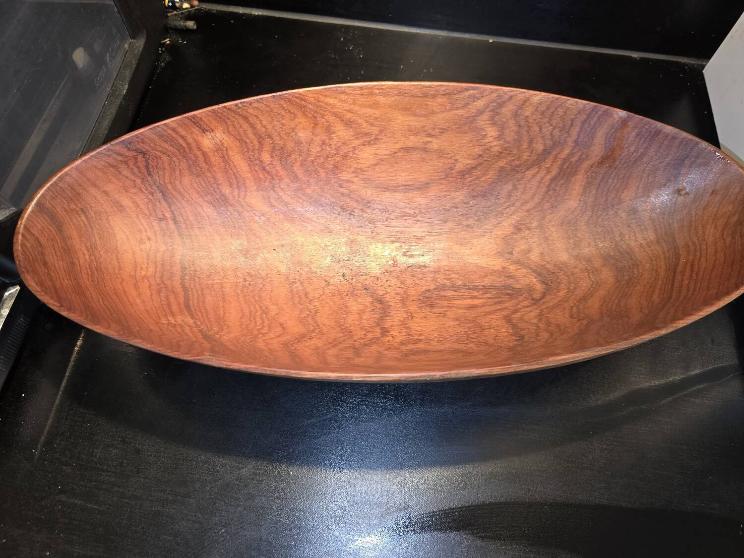 solid wood shuttle with a sleek and organic design.