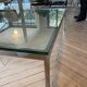 Table basse design Italien verre épais et acier brossé