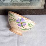 Old bowl in earthenware with floral decoration.