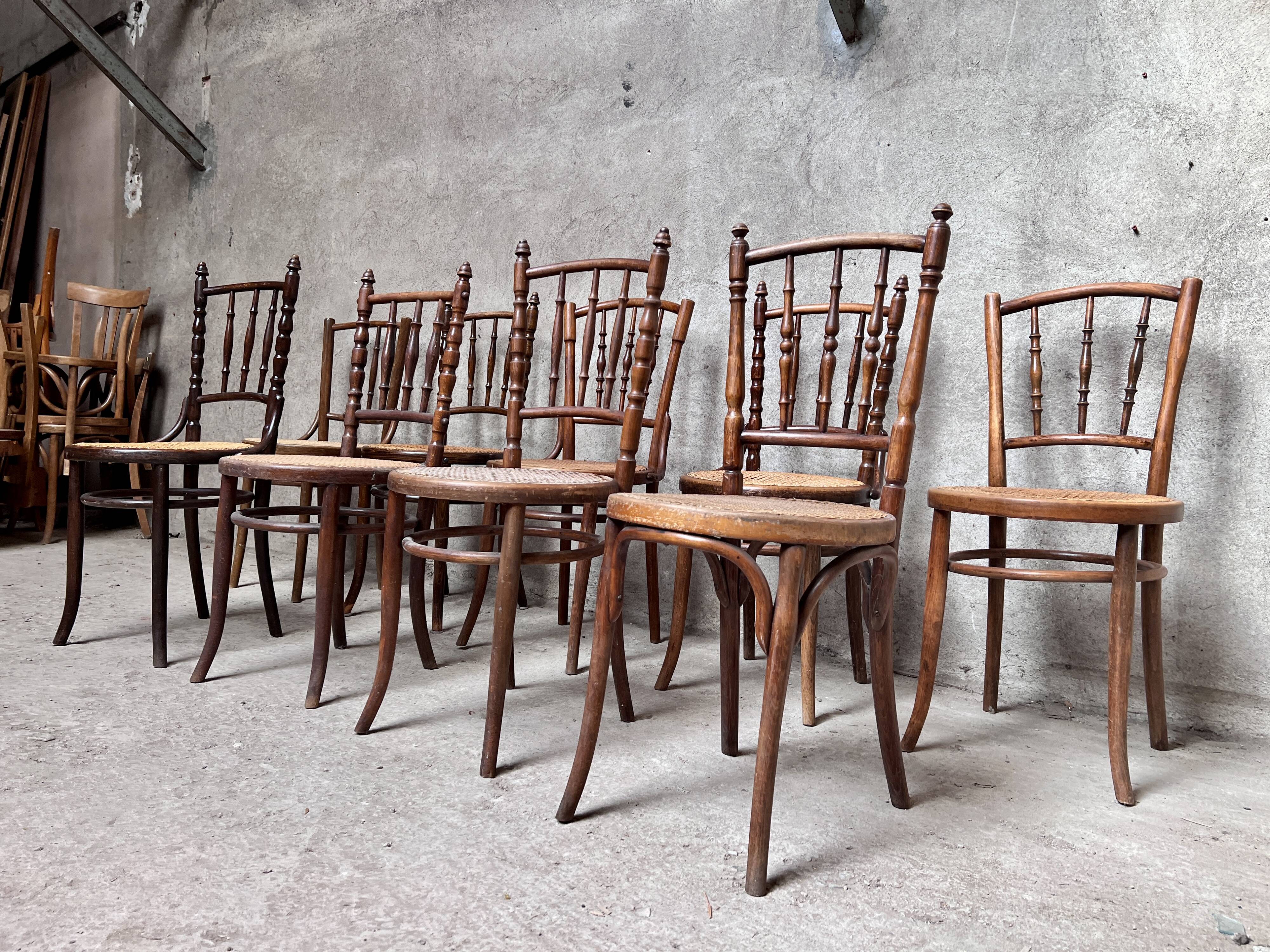 Series of 7 old bar cane cane bistro chairs