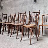 Series of 7 old bar cane cane bistro chairs