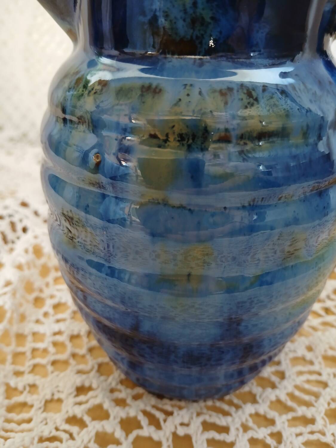 Antique pitcher in enamelled ceramic