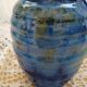 Antique pitcher in enamelled ceramic